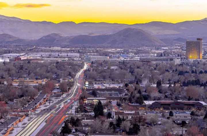 sparks nevada at sunset with a highway